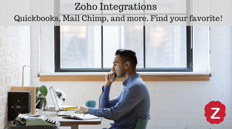 Guy sitting at his computer looking at Zoho integrations by Zbrains